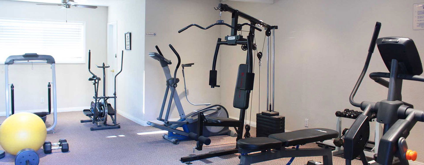 This image shows the gym interior of The Gondolier Apartments